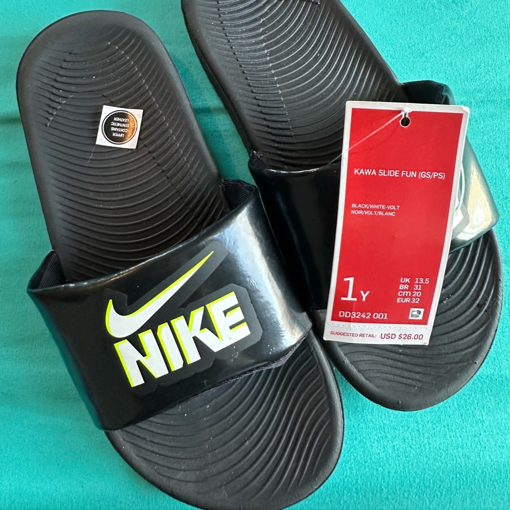 Nike slides.